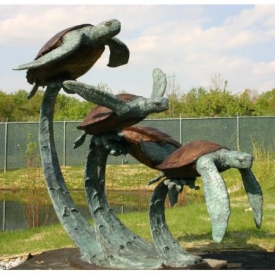 Záhradní bronzová socha - Ctyri plovouci morske zelvy